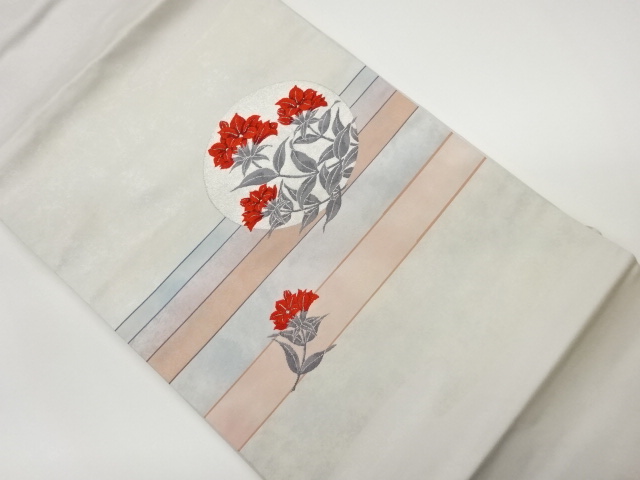 横段に丸紋・草花模様織出し名古屋帯